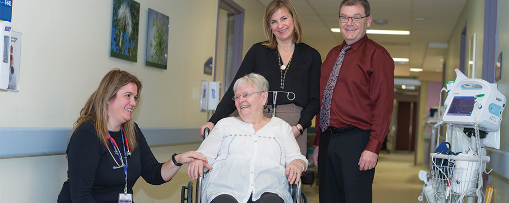 patient at guelph general with nurse and family
